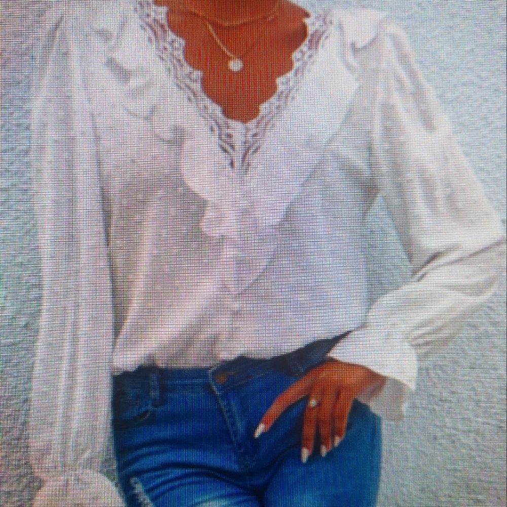 White v-neck ruffled blouse